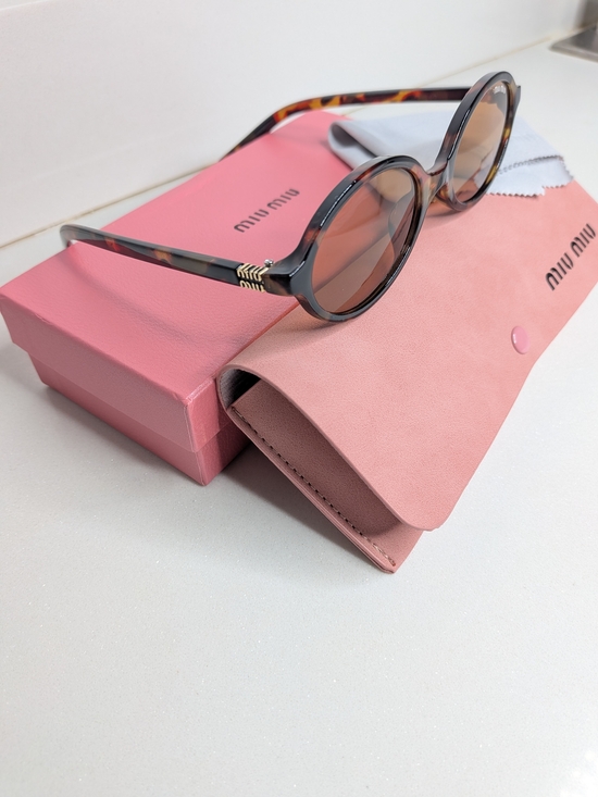 Miu Miu Accessories - Miu Miu Tortoiseshell Oval Sunglasses in Brown